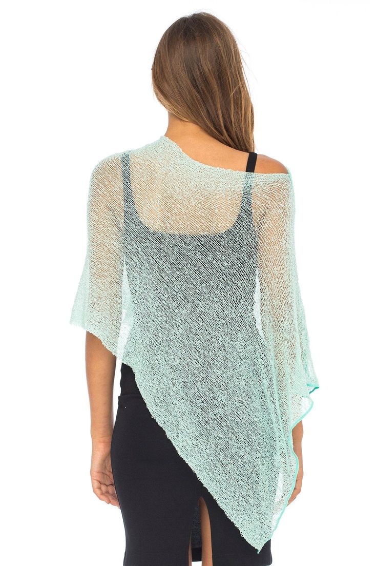 Sexy and sheer, this aqua lightweight shrug poncho sweater tops your look effortlessly with a knitted loose pullover design and effortless drape Simple poncho silhouette fits like a lightweight shawl, providing coverage to the elbow or longer; asymmetrical hem lets you choose how to wear it, adding a little coverage over the hips Cropped knitted cardigan is the perfect weight as a spring or summer shrug to add a pop of color; soft viscose knit is sheer and feminine, never wrinkles and packs like Sheer Poncho, Loose Pullover Sweater, Poncho Top, Sweater Tops, Poncho Tops, Loose Pullover, Tie Dye Dress, Dyed Dress, Poncho Sweater