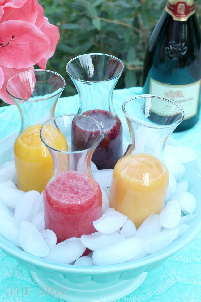 an assortment of drinks and ice on a plate