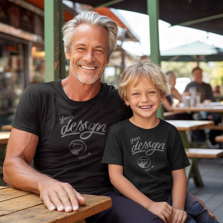 INSTANT DOWNLOAD - no physical item will be delivered Experience the bond between generations with our heartwarming black T-shirt mockup featuring a proud grandfather and his beloved grandchild. This endearing mockup captures the essence of family love and connection, making it perfect for showcasing your designs aimed at celebrating family ties. Share the joy and nostalgia with your audience by utilizing this captivating mockup that embodies the special bond between grandfather and grandchild. Once your payment is cleared, you will receive an email with the download link. You can also access your purchase via your Etsy profile. Download the files, and start working on your images.  The high-resolution JPG file of t-shirt mockup will be blank and without any watermarks. Use any image editi Casual Black T-shirt For Father's Day, Casual Black Top For Father's Day, Father's Day Black Graphic Tee, Custom Print Tops For Father's Day Fan Merchandise, Father's Day Fan Merchandise Tops With Custom Print, Father's Day Black Shirt With Graphic Print, Father's Day Black Graphic Print Shirt, Black Graphic Print Shirt For Father's Day, Black Graphic Tee For Family Occasions