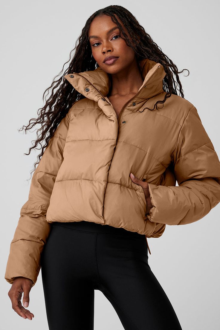 We can’t decide what we love most about the best-selling Gold Rush Puffer. Maybe it’s the weather-resistant ripstop and the wonderfully warm fill. Or the tall collar, snap front and zippered pockets. Or the flattering slightly cropped hem and cinchable bungees. Pick your color and get ready to wear it on repeat Fall Puffer Jacket With Padded Collar For Outdoor Activities, Puffer Outerwear For Outdoor Activities In Fall, Alo Yoga Hooded Outerwear For Winter, Weatherproof Puffer Jacket For Fall, Weatherproof Fall Puffer Jacket For Cold Weather, Weatherproof Puffer Jacket For Cold Fall Weather, Fall Weatherproof Puffer Jacket For Cold Weather, Alo Yoga Winter Outerwear With Pockets, Nylon Utility Puffer Jacket For Fall