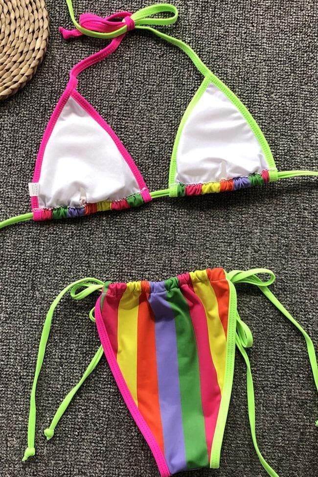 Cute two piece swimsuit featuring a sliding triangle bikini swim top with pad cups, adjustable straps tied on neck and back, and a pair of ruched bikini bottom with tied side string in cheeky fit. Allover in contrast color.Size Guide:Size (in)USBustWaistHipS4-631-3324-2635-37M8-1033-3526-2837-39L12-1435-3728-3039-41 String Swimwear For Sunbathing And Beach Season, String Swimwear With Drawstring For Vacation, Vacation String Swimwear With Drawstring, String Swimwear For Sunbathing, String Beachwear For Beach Party, Drawstring Tie-side Bottom Swimwear For Beach Season, Multicolor Tie-side Swimwear For Beach Party, String Swimwear With Drawstring, Summer String Swimwear For Beach Party