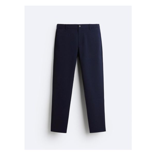 Pants made of high stretch fabric. Elastic waist. Front pockets and back welt pockets. Front zip and button closure. Studio Nicholson, Crochet Coat, Elastic Fabric, Stretch Pants, T-shirt Polos, Blazer Dress, Trouser Jeans, Mens Trousers, Linen Shirt