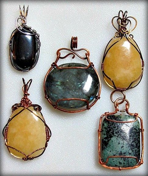 four pendants with different shapes and colors