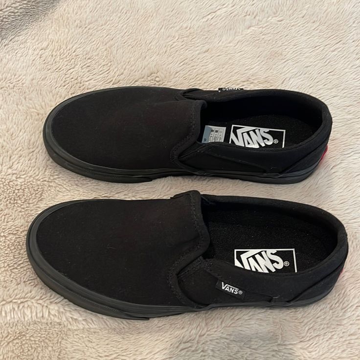 Vans- Women’s Black Slip-On Sneakers Size: 6.5 In Women’s - All Black And Brand New- Never Been Worn- Nwot: Unfortunately, My Daughter Grew Out Of Them Before She Could Wear Them And Already Had Cut Off The Tag And Thrown The Box Away. Casual Vans Slip-ons With Round Toe, Black Low-top Slip-ons With Rubber Sole, Black Casual Slip-on Skate Shoes, Casual Black Slip-on Skate Shoes, Vans Black Sneakers With Cushioned Footbed, Black Vans Sneakers With Cushioned Footbed, Black Slip-on Skate Shoes For Streetwear, Sporty Black Slip-ons With Cushioned Footbed, Casual Black Slip-on Sneakers For Skateboarding