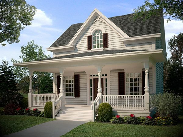 a small white house with red shutters on the front and porches, along with steps leading up to the second floor