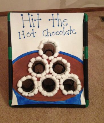 a book with chocolate candies in the shape of a football on it and writing hit the hot chocolate