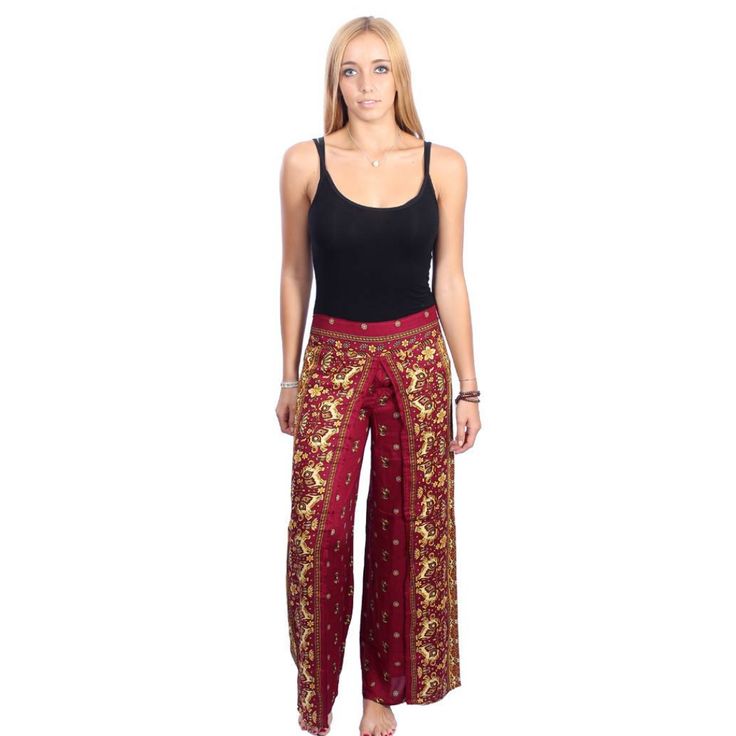 These cute and colorful pants are handmade with harem pants, handmade with an elastic waistband and relaxed, cotton-poly fabric.These trousers are are perfect for relaxing at home, working out, yoga running, beachwear and general casual wear. Also recommended for Thai massage, dance and festivals.* Red: 29" L x 37" H x 44" W*Mustard: 34.5" L x 37" H x 44" W*White: 38" L x 37" H X 47" W* Made following Fair Trade guidelines* Handmade in Thailand Red Cotton Full-length Harem Pants, Hippie Full-length Harem Pants With Elastic Waistband, Bohemian Rayon Wide-leg Harem Pants, Bohemian Wide-leg Pants With Paisley Print, Colorful Pants, Home Working, Bohemian Wide-leg Paisley Print Pants, Thai Massage, Colored Pants