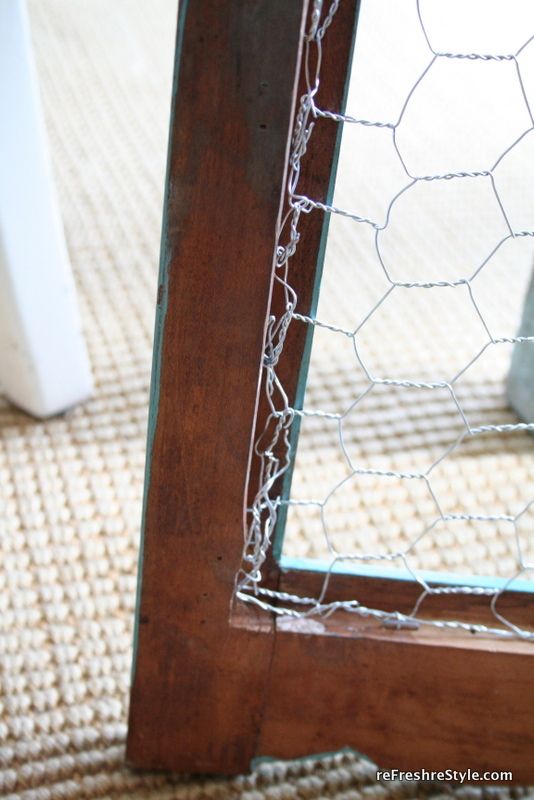 a chicken wire door frame on the floor