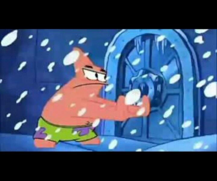 the spongebob character is standing in front of a door with snow falling on it