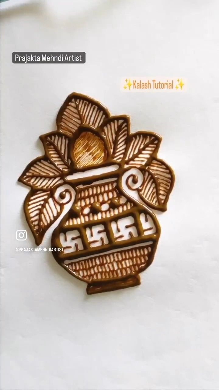 an intricately designed brooch is shown on a white surface with the words, kalash