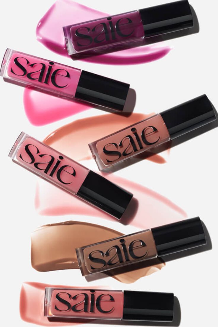 Get luscious lips with SAIE GLOSSYBOUNCE! 💋✨ This vegan lip gloss-oil hybrid combines the slip of a lip oil with the high shine of a sheer-tinted gloss. With a plush, non-sticky feel, it deeply hydrates and nourishes for juicy shine. Available in 6 shades for irresistible allure! #LipGloss #Hydration #SAIEBeauty Saie Lip Oil, Saie Lip Gloss, Hydrating Lip Oil, Vegan Lip Gloss, Lip Gloss Shades, Lip Oils, Dream Diary, Tinted Gloss, Wishlist 2024