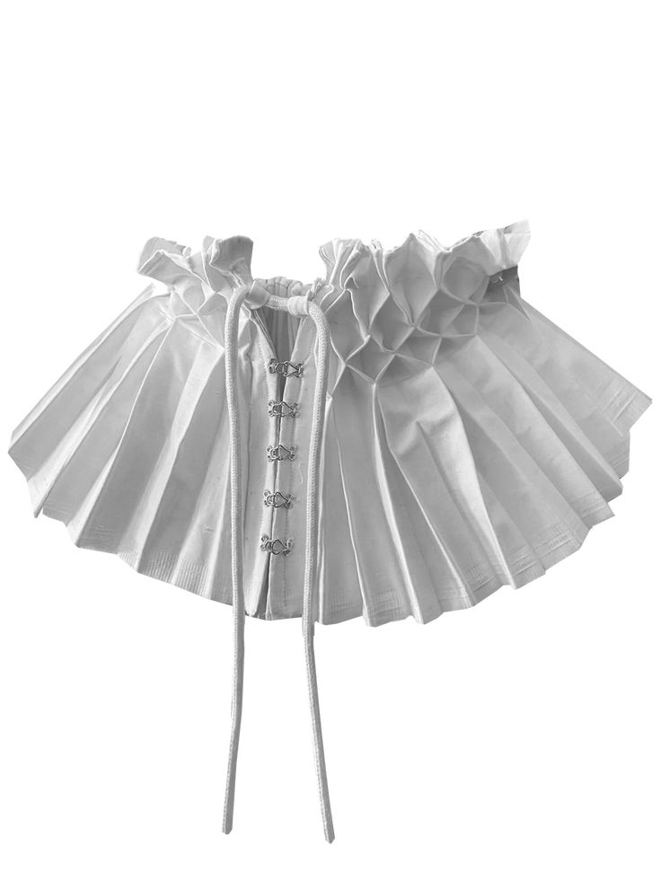 a white corset with ruffles on it