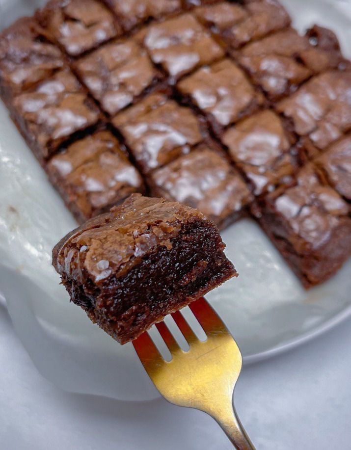 a fork with some brownies on it