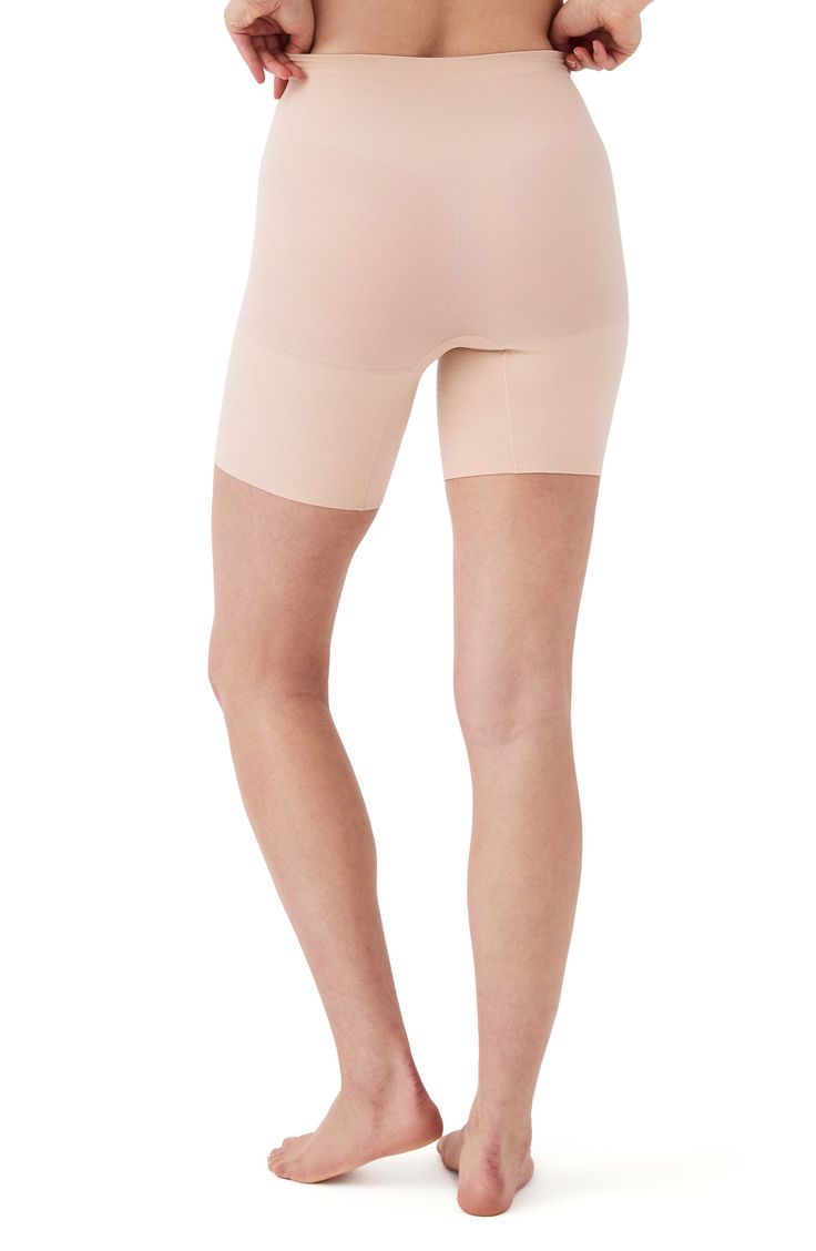 Feel supported in these shaping shorts made with seamless knitting that targets your core for a smooth look that's invisible under clothes. Lined gusset 55% nylon, 45% elastane Machine wash, tumble dry Imported Compression Shapewear With Built-in Shorts, High Stretch Shapewear With Built-in Shorts, Beige Shapewear With Built-in Shorts, Compressive Shapewear With Built-in Shorts, Compressive Seamless Beige Shorts, Stretch Boxer Briefs Shapewear, Stretch Shapewear Boxer Briefs, Seamless Micro-elastic Mid-thigh Biker Shorts, Shaping Bottoms With Built-in Shorts In Short Length