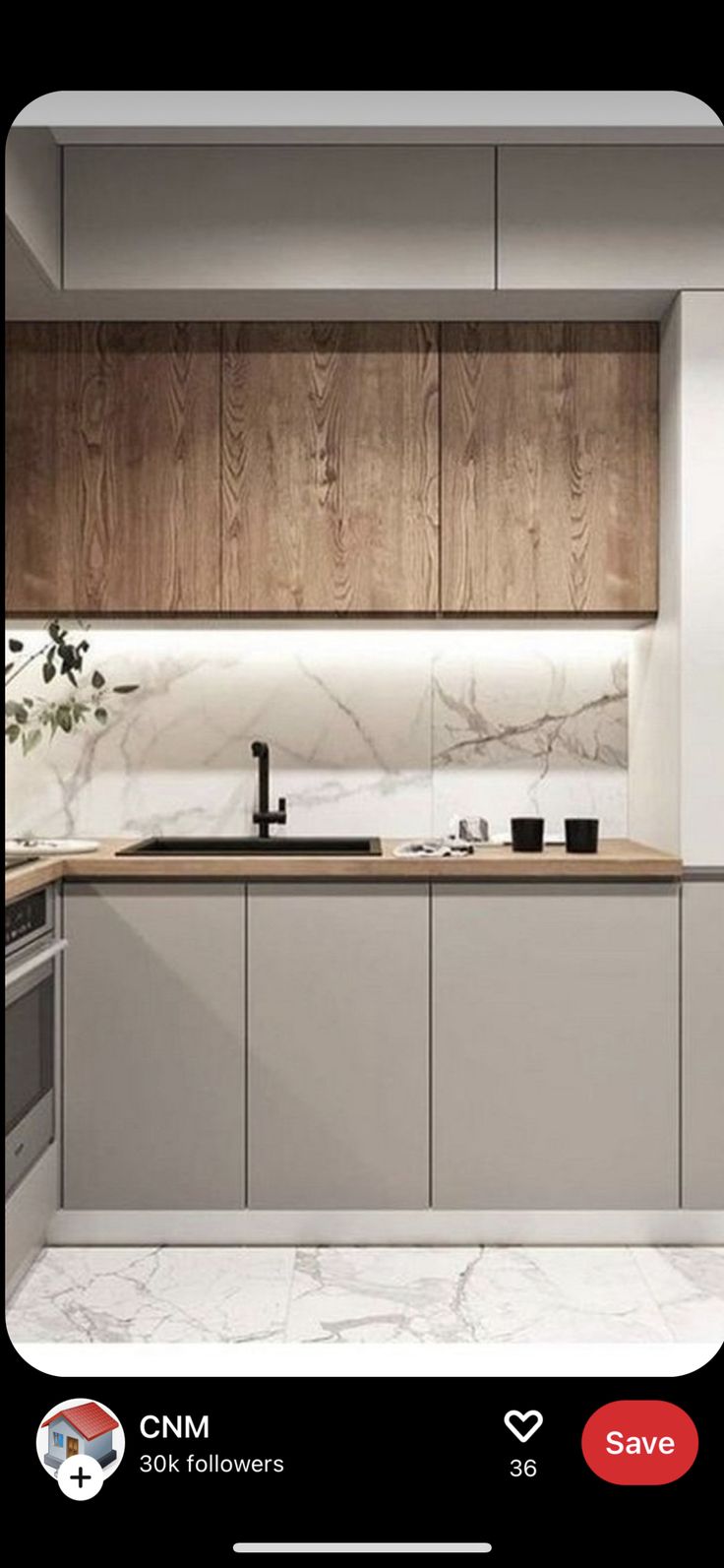 a kitchen with marble counter tops and wooden cabinetry, along with an appliance