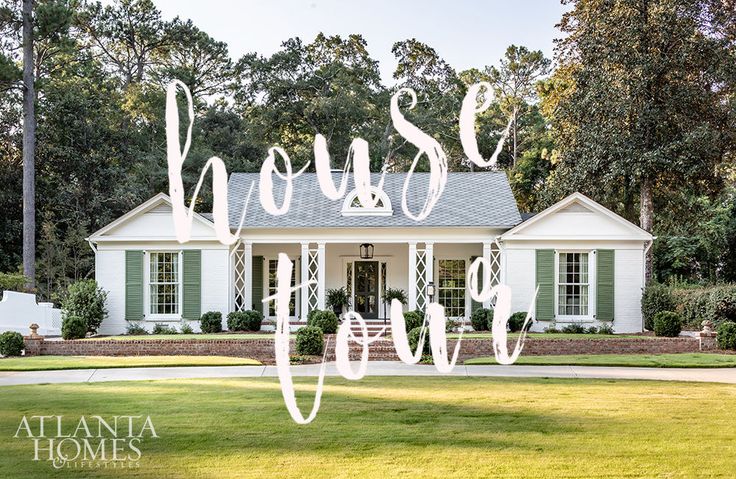 a white house with the words house love spelled in front