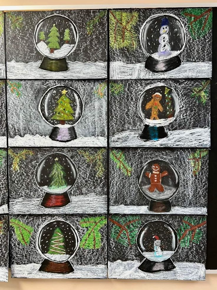 several snow globes with christmas trees in them