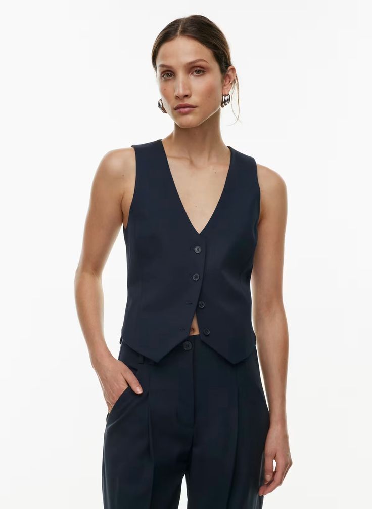 Babaton DENIRO VEST | Aritzia US Classic Fitted Vest For Layering, Classic Sleeveless Vest For Layering, Tailored Workwear Vest With Buttons, Tailored Buttoned Vest For Workwear, Tailored Vest With Button Closure For Workwear, Elegant Wool Vest For Office, Fitted Vest With Button Closure For Layering, Elegant Vest For Layering, Classic Wool Vest For Office