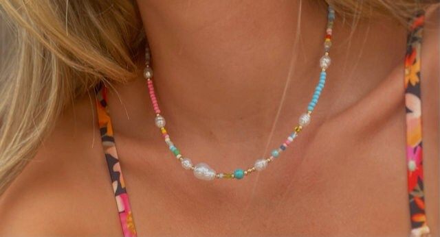 This necklace is the perfect pop of color for your summer dinner out or for lounging around the beach. The touch of pearls give it a classier feel which making it easy to dress it up or down. Elegant Summer Festival Necklaces, Summer Party Beaded Necklaces With Round Beads, Bohemian Beaded Necklaces For Summer Party, Summer Party Beaded Necklace With Beaded Chain, Summer Party Beaded Necklaces, Summer Bohemian Beaded Necklaces For Party, Summer Party Bohemian Beaded Necklaces, Summer Party Beaded Necklace, Trendy Beaded Chain Pearl Necklace For Party