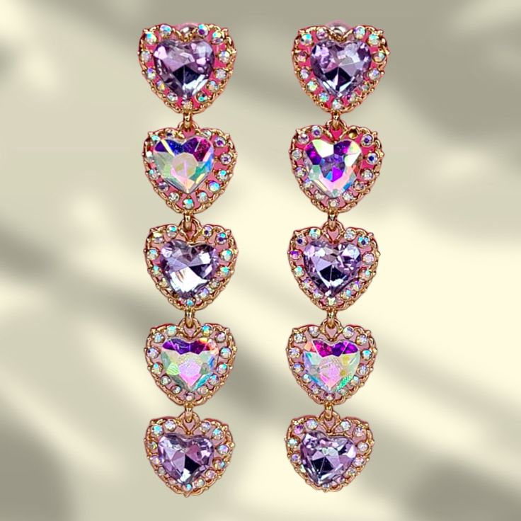 Purple Heart Rhinestone Drop Earrings. Earring Type: Drop Earrings Size: 9cm Long, 1.5 Cm Wide Material: Zinc Alloy Purple Heart-shaped Jewelry For Party, Heart Shaped Purple Jewelry For Party, Heart-shaped Purple Jewelry For Party, Purple Rhinestone Crystal Earrings For Party, Party Purple Crystal Rhinestone Earrings, Purple Earrings For Valentine's Day Party, Purple Crystal Earrings With Rhinestones, Purple Crystal Rhinestone Earrings, Purple Sparkling Crystal Earrings For Parties