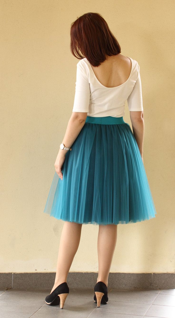 "Women tulle skirt from soft tulle for special occasion. Skirts are made from 4 - 6 layers tulle and soft lining. Elastic waistband for perfect fit and comfort. Each item are handmade and excelent quality. Usually tulle skirt sewing takes about 1 week. Shipping to US - 5 till 7 days, to UK - 4 till 7 days. If you need skirt for a specific date, please write it in the order notes. In first picture model is 5.5ft (1.67 m) tall and wears 24\" (61cm) skirt length (6 layers). The length of the skirt Spring Knee-length Dresses With Tulle Skirt, Elegant Knee-length Tulle Skirt, Blue Knee-length Flowy Skirt, Stretch Knee-length Tulle Skirt, Mint Tulle Skirt, Light Blue Skirts, Womens Tulle Skirt, Dance Tutus, Layered Tulle Skirt