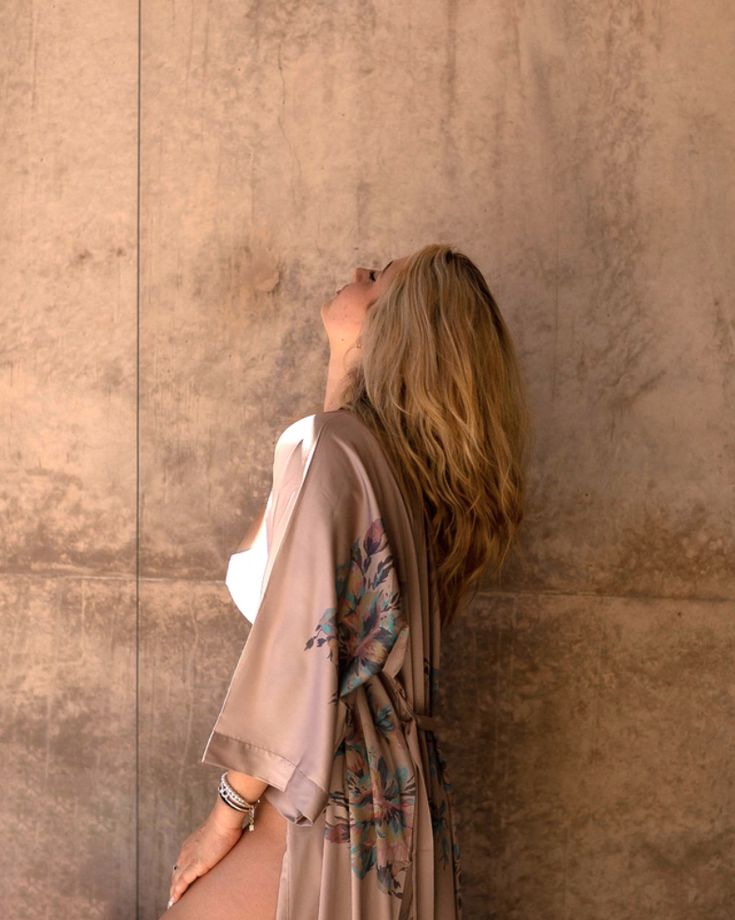 The fluid drape of our Charmeuse Collection has the softness of silk and the durability to wash at home. It's the perfect silk-alternative. Shop our whole Charmeuse Collection via link in bio! photo: @ashleystreff and @socialwellcreative Brown Wrap Kimono For Spring, Spring Brown Wrap Kimono, Bohemian Wrap Robe With Tie Waist, Bohemian Wrap Kimono With Tie Waist, Bohemian Kimono With Tie Waist And Kimono Sleeves, Elegant Flowy Wrap Kimono, Elegant Beach Kimono With Tie Waist, Elegant Tie Waist Kimono For Beach, Summer Silk Kimono With Tie Waist