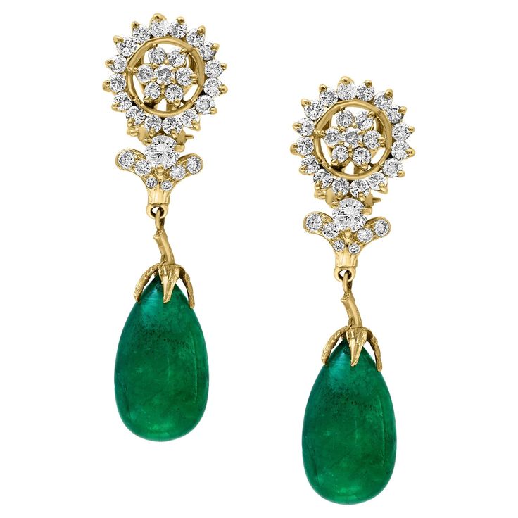 GIA Certified 28 Ct Emerald Cabochon & Diamond Drops Hanging Earrings 14 KYG This exquisite pair of earrings are beautifully crafted with 14 karat yellow gold weighing 14 grams Two fine Cabochon Emerald weighing approximately 14 carats each totaling approximately 28 carats of Emerald Drops. Finest color and quality. There are brilliant cut diamonds which are making a circular surround around a 7 piece diamond flower. Total diamond weight approximately 2 ct Origin Zambia GIA Certificate # 2239113214 Color: Deep Green, Transparent extreme Fine Color Quality Earring has a post and Omega backs. Very comfortably sits on the earlobe . FOLLOW MonalisaJewelry Inc. storefront to view the latest collection. We encourage you to take a look at all the pictures provided for this item. As it can be diff Emerald Cabochon, Gia Certificate, Hanging Earrings, Diamond Flower, Diamond Drops, Zambia, Deep Green, Brilliant Cut Diamond, Beautiful Things