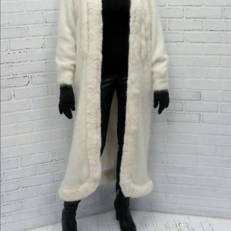 Woman’s Angora (Rabbit) Full Length Sweater Coat. Cruelty Free. Pelts Around Collar. White With Two Side Pockets. Lining Is Polyester. Very Warm. Beautiful To See & Wear Elegant Winter White Fur Coat With Long Sleeves, Elegant Long Sleeve Winter White Fur Coat, White Formal Outerwear For Winter, Classic White Fur Coat For Winter, White Fur Coat For Formal Winter Occasions, Classic White Long Sleeve Fur Coat, Classic White Long Outerwear, White Formal Fur Coat For Winter, White Formal Winter Fur Coat