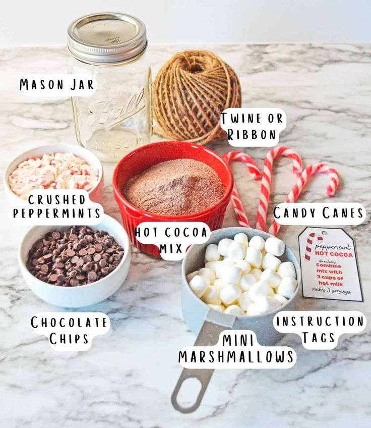 ingredients to make peppermint marshmallows recipe on marble counter top with candy canes