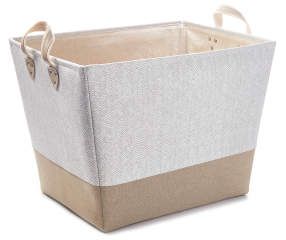 a white and tan basket with handles on the bottom is sitting against a white background