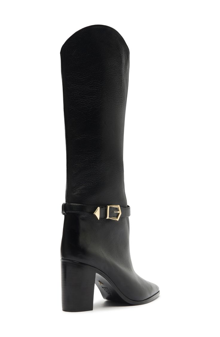 A geometric buckle accents the ankle strap on a pointy-toe leather boot shaped in a versatile knee-high silhouette. 3 1/2" heel (size 8.5) 14 1/2" shaft; 15 3/4" calf circumference Pull-on style Leather upper/leather and synthetic lining/leather sole Made in Brazil Elegant Fitted Knee-high Boots With Buckle Closure, Wide Calf Heeled Boots With Buckle For Work, Wide Calf Heeled Boots With Buckle Closure For Work, Ankle Strap Boots With Buckle Closure For Work, Buckle Closure Ankle Boots For Work, Luxury Heeled Boots With Buckle For Fall, Luxury Heeled Boots With Buckle Closure For Fall, Designer Heeled Boots With Buckle For Fall, Designer Heeled Boots With Buckle Closure For Fall