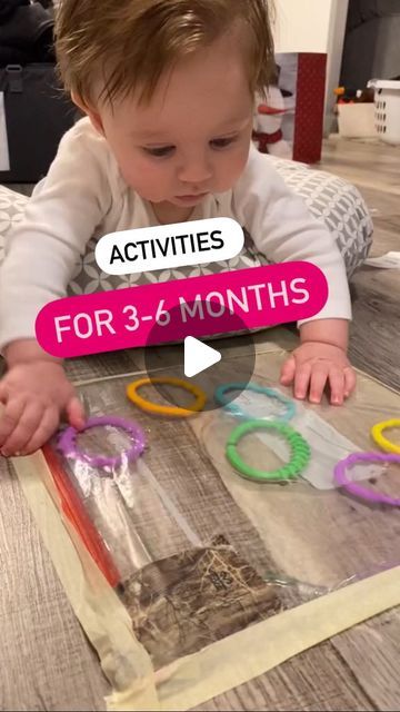 a baby is playing with some scissors on the table and it says activities for 3 - 4 months