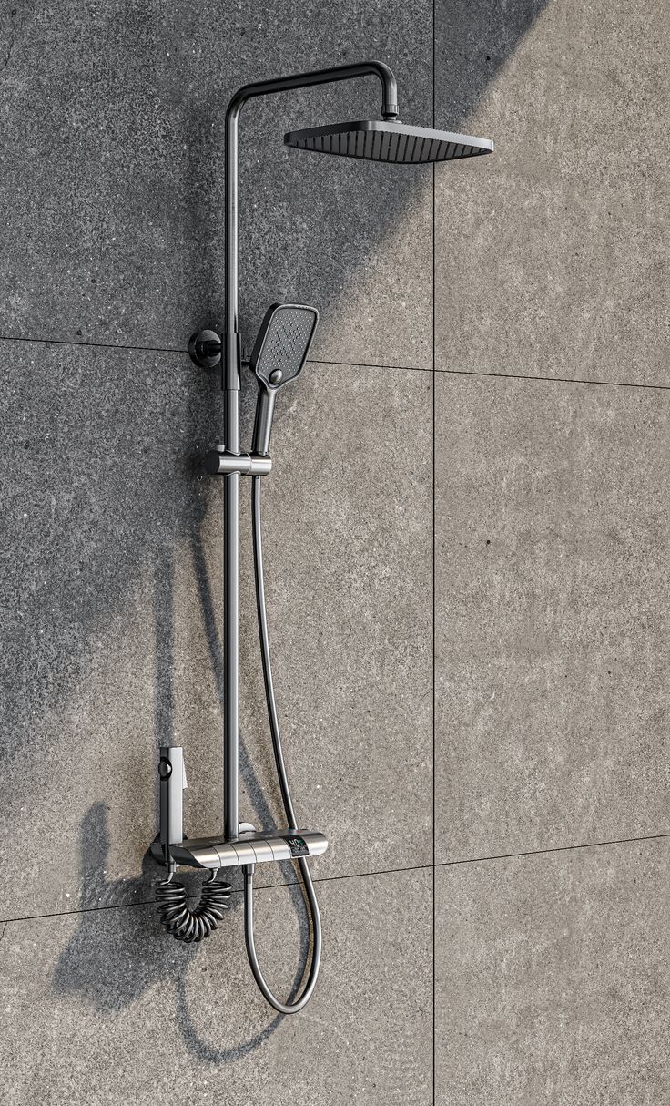 a shower head and hand held shower faucet on the side of a wall