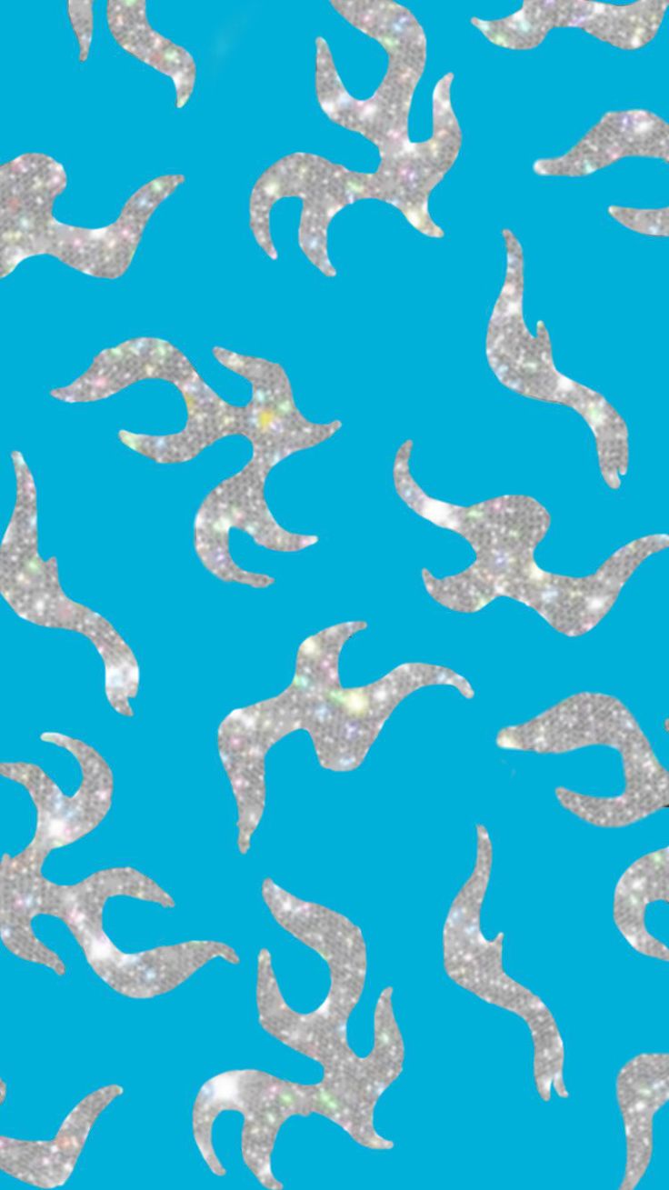 a blue background with silver swirls and sparkle on the bottom right hand corner is an image of birds flying in the sky