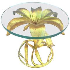 a glass table with yellow flowers on it