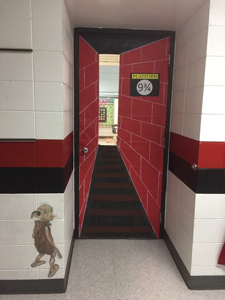 the hallway is painted red, white and black with an image of a dog on the door