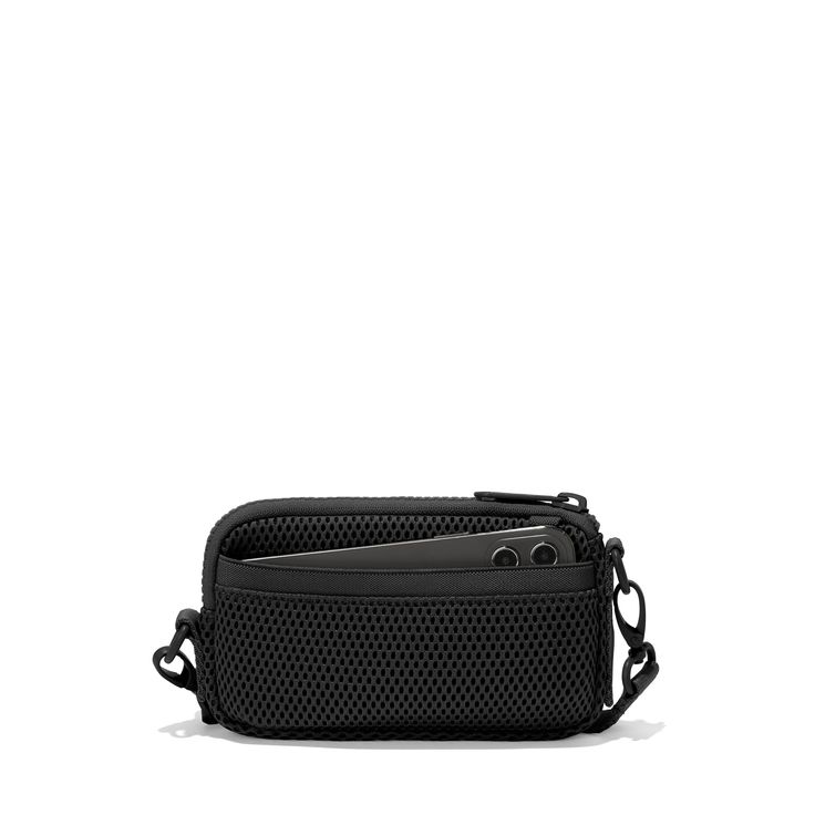 a small black bag with an open pocket on the front and one side that has holes in it