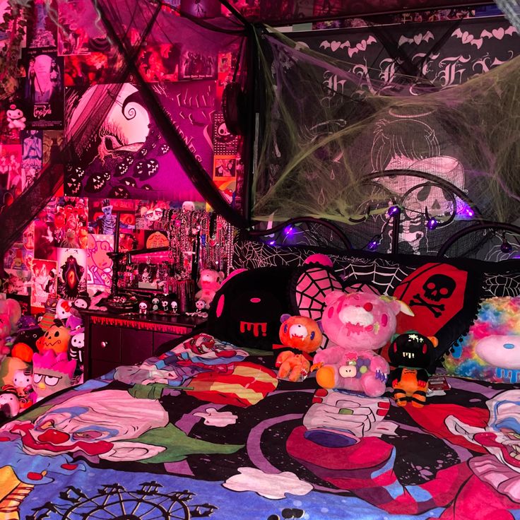 a bed covered in lots of cartoon characters