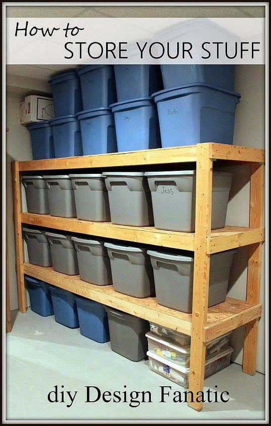 the shelves are filled with plastic buckets and other storage bins in this garage