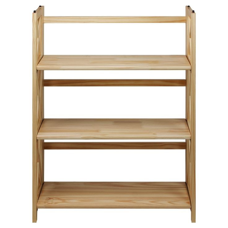 a wooden shelf with three shelves on each side and one shelf above the other, against a white background