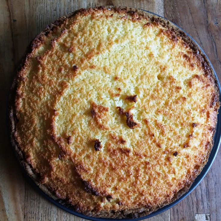 a pie sitting on top of a wooden table