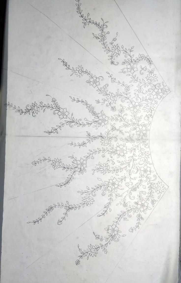 an image of a drawing on paper with lines and flowers in the shape of a circle