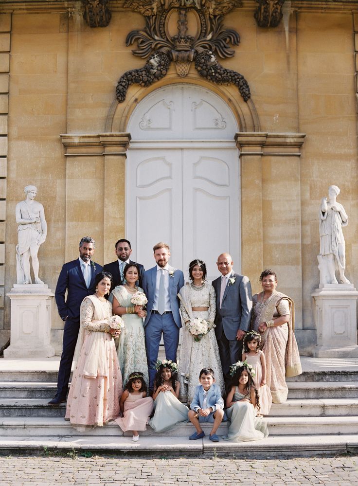 a group of people standing in front of a building