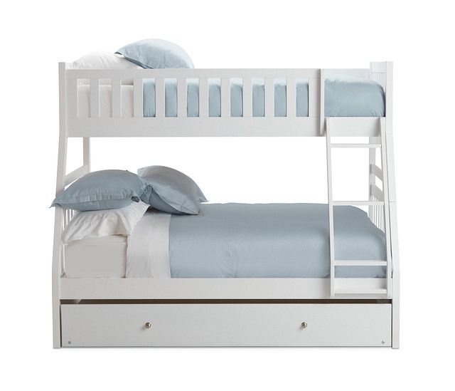 a white bunk bed with blue sheets and pillows on top of it, against a white background