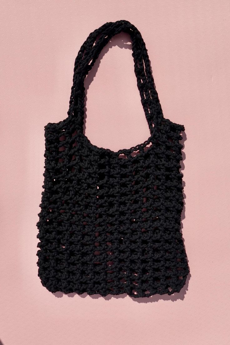 Elevate your everyday style with this chic and eco-friendly Customizable Mesh Crochet Tote Bag! Handcrafted with durable, lightweight yarn, this tote is perfect for carrying groceries, beach essentials, or your daily must-haves in style. The open mesh design gives it a modern, airy feel while still being sturdy enough to hold all your items securely. Its versatile black color makes it easy to pair with any outfit, whether you're heading to the farmer's market or enjoying a day out. Hand-crocheted for a unique, artisanal touch Lightweight and foldable for easy storage Strong and spacious enough to carry groceries, books, or beach essentials Perfect for eco-conscious shoppers and fashion lovers alike Stylish black mesh design for a minimalist, modern look Great gift idea for friends and fami Chic Lightweight Beach Bag For Everyday Use, Trendy Lightweight Natural Crochet Bag, Chic Lightweight Crochet Bag For Summer, Trendy Lightweight Crochet Bag For Everyday Use, Casual Crochet Beach Bag For Daily Use, Casual Lightweight Beach Bag, Lightweight Casual Crochet Bag For Everyday, Versatile Cotton Shoulder Bag For Summer, Reusable Beach Bag For Everyday Summer Use