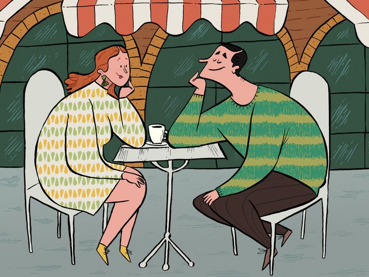 a man and woman sitting at a table talking to each other in front of an awning