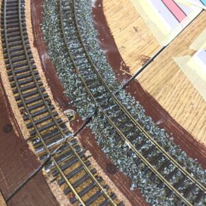 an overhead view of a model train track