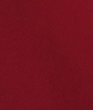 a red fabric background with white stitching