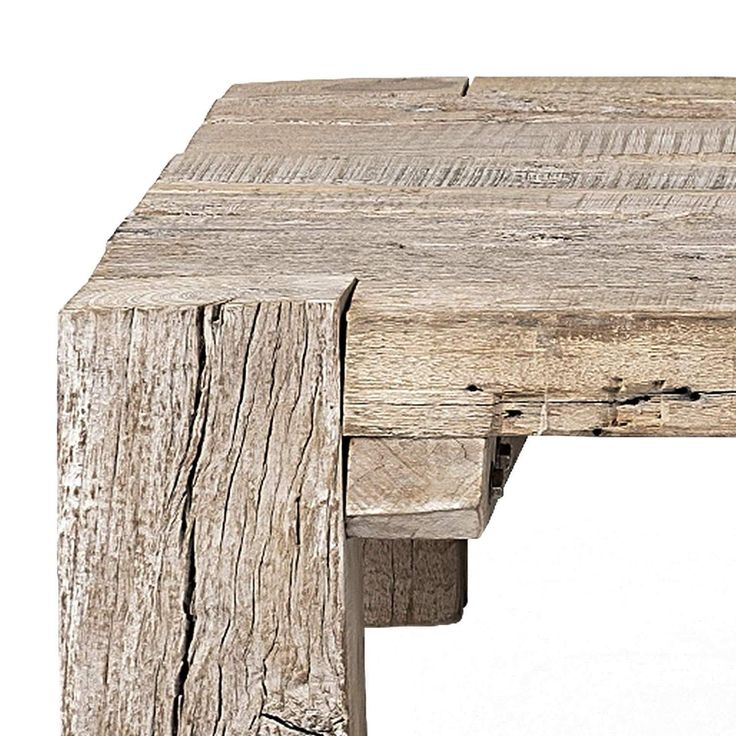 an old wooden table that has been weathered