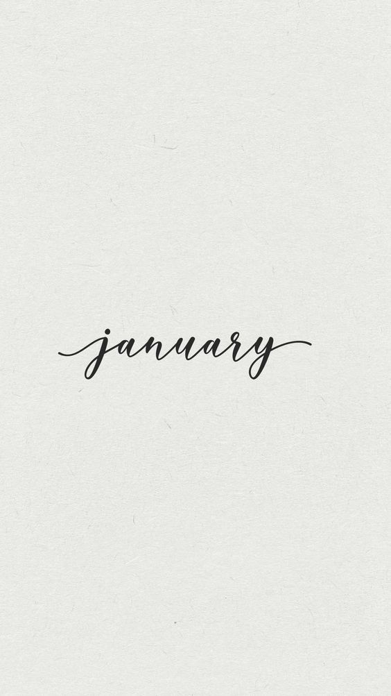 the word january written in cursive writing on a white paper with black ink